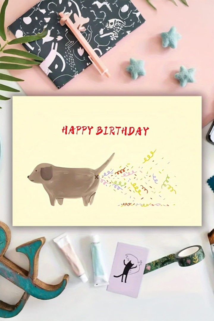 Narozeninové přání se psem a konfetami "Happy Birthday"